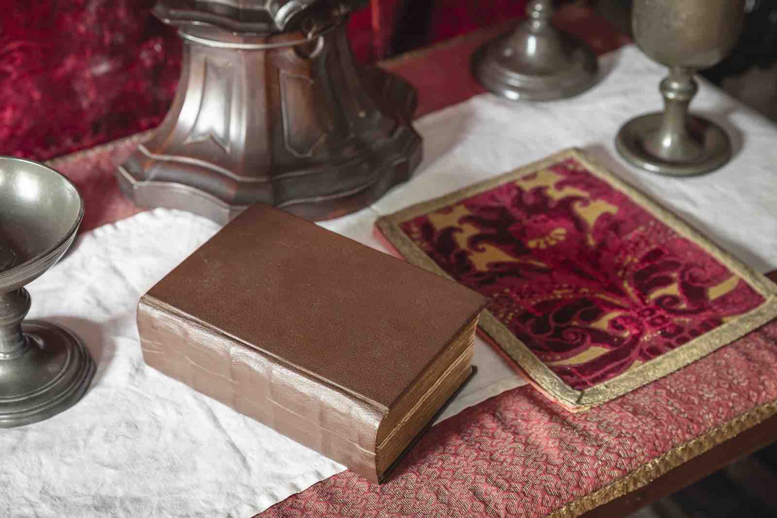 The missal on the altar in the Attic Chapel at Moseley Old Hall